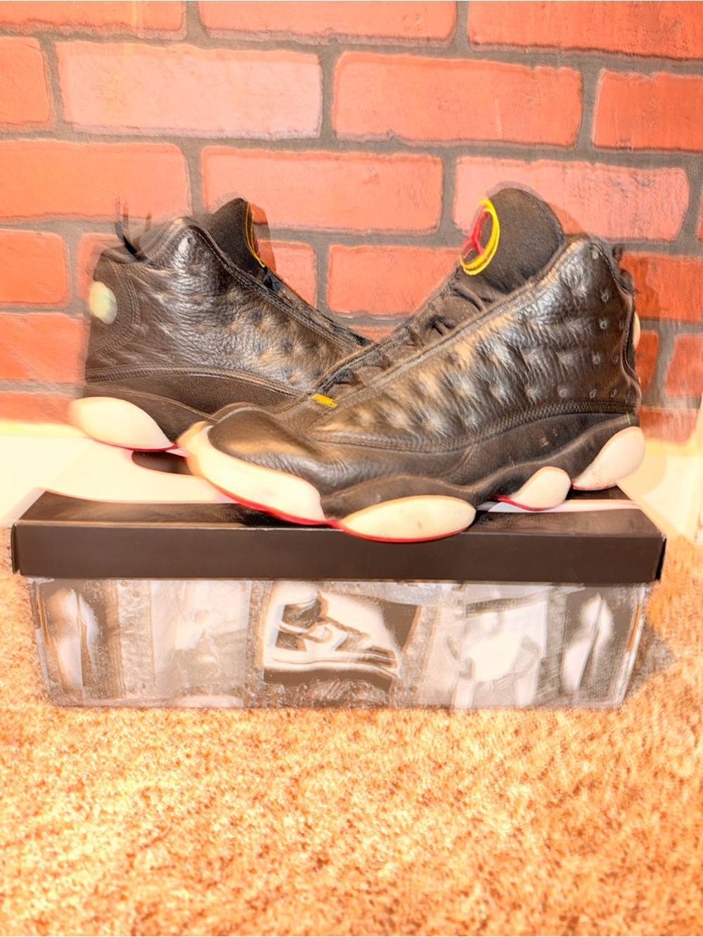 Jordan Black Leather High-Top Sneakers with Red and Yellow Accents